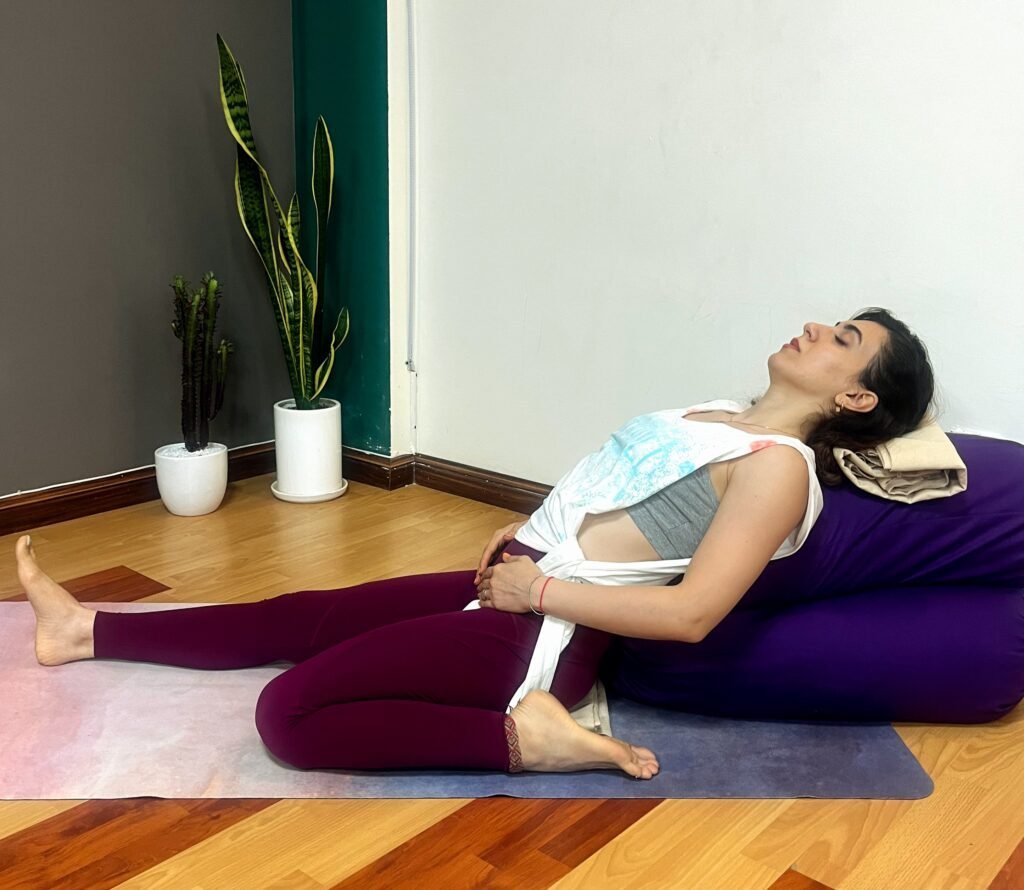 Restorative pose with a bolster